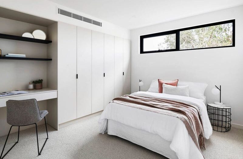 27 central ave black rock bedroom with large rectangular window above bed, cupboard and study notes