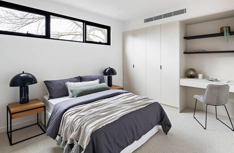 27 central ave black rock, bedroom with two bedside tables and two large mushroom looking lamps, cupboard space and a study nook