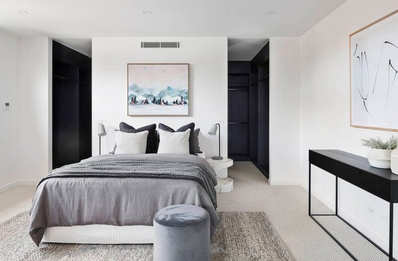 27 central ave black rock bedroom with artwork above bed, walk around wardrobe