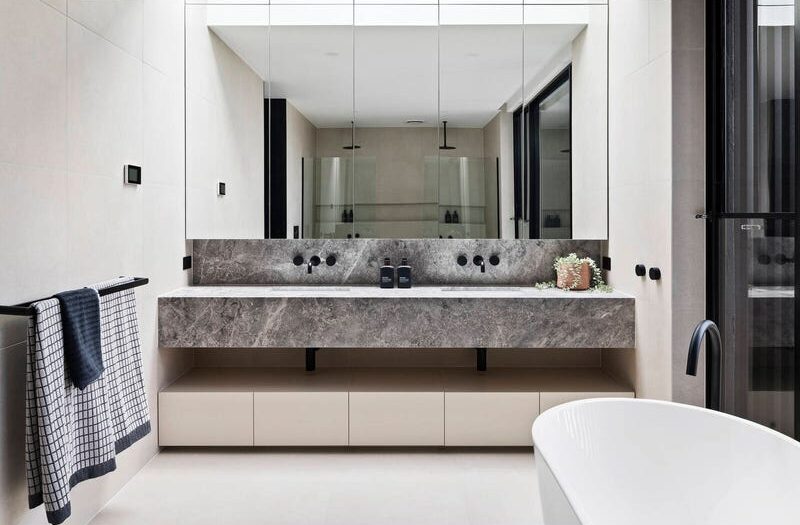 27 central ave beaumaris double basin cut into the stone vanity, large mirrors and black accents