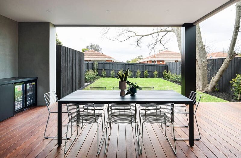 27 central ave black rock outdoor area with table and chairs, looking out over the grass