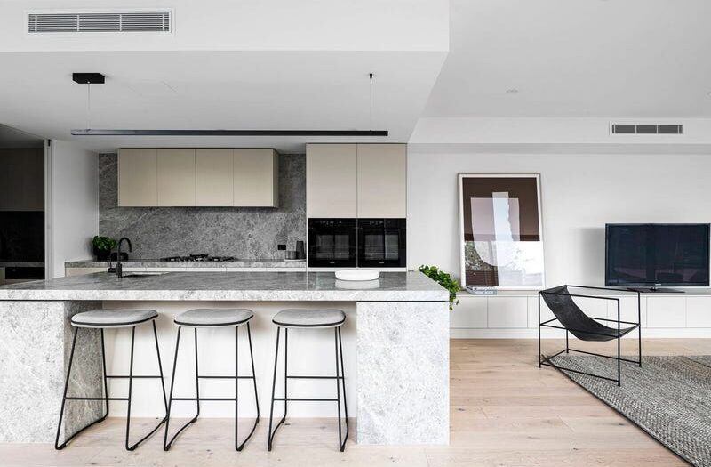 27 central ave black rock kitchen with double oven, creme cupboards, stone splashback, benchtop and island bench