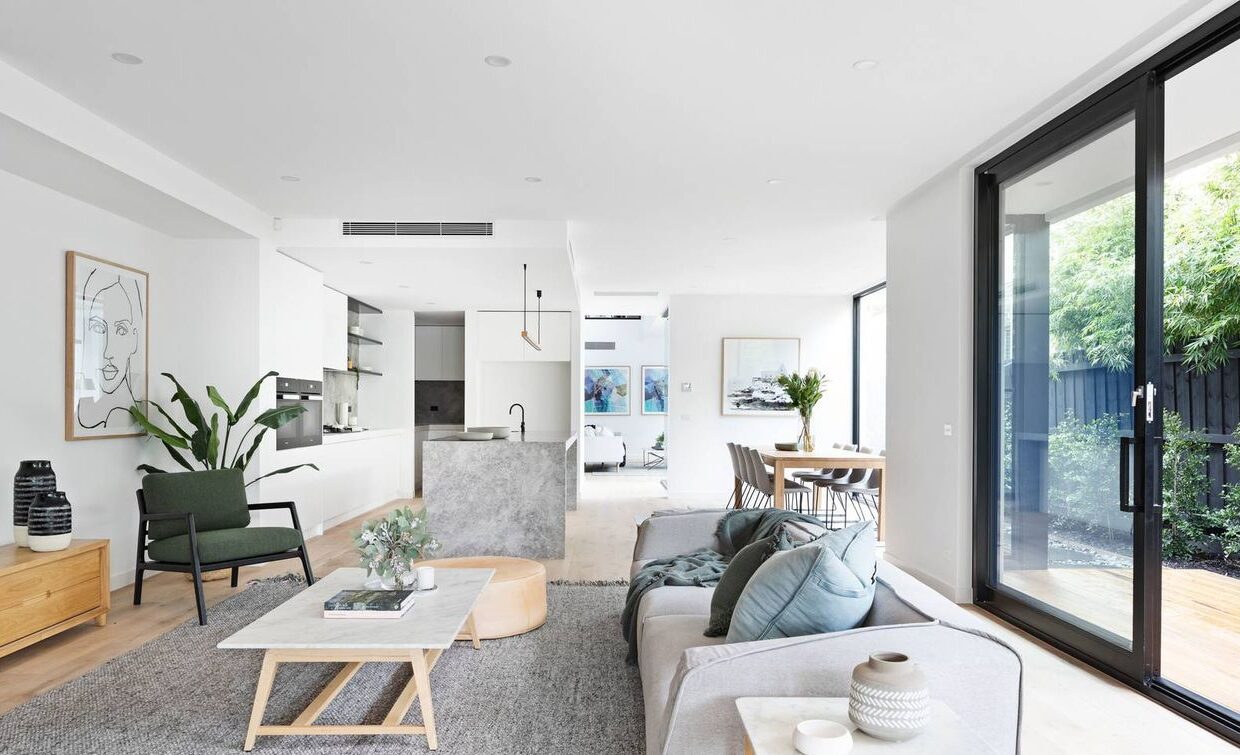 open living area, looking into kitchen, walk in pantry, dining room and 2nd lounge room