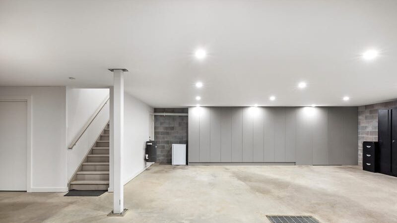 66 thomas st brighton east garage with concrete floor, stairs to main house, storage along the side walls