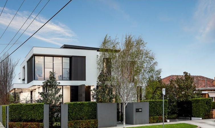 66 thomas st brighton east front of multistory house, fence broken up with green lush hedges